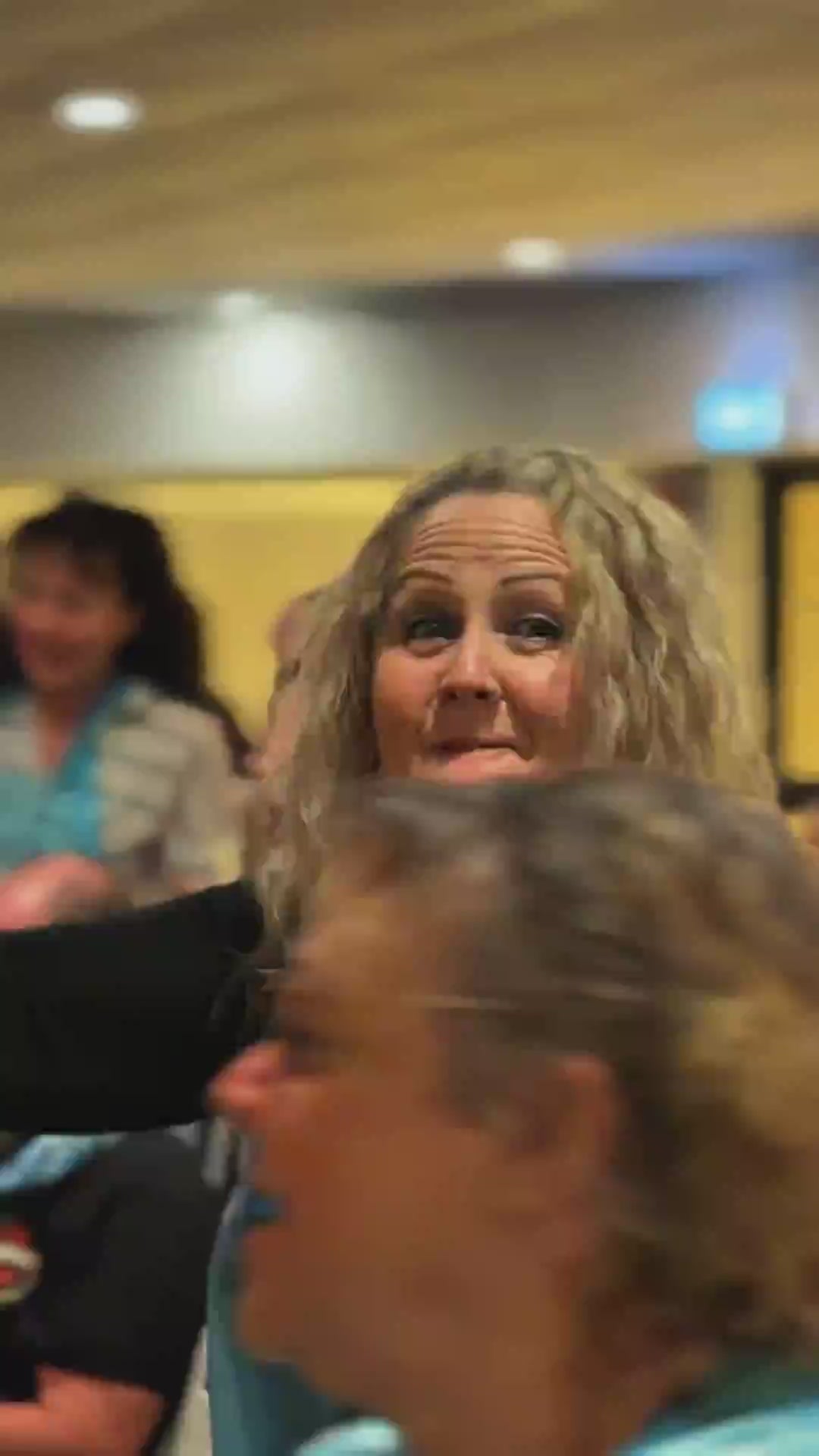 Booked out crowd at the Hervey Bay Hotel Aussie Rock Paint and Sip holding their koala paintings