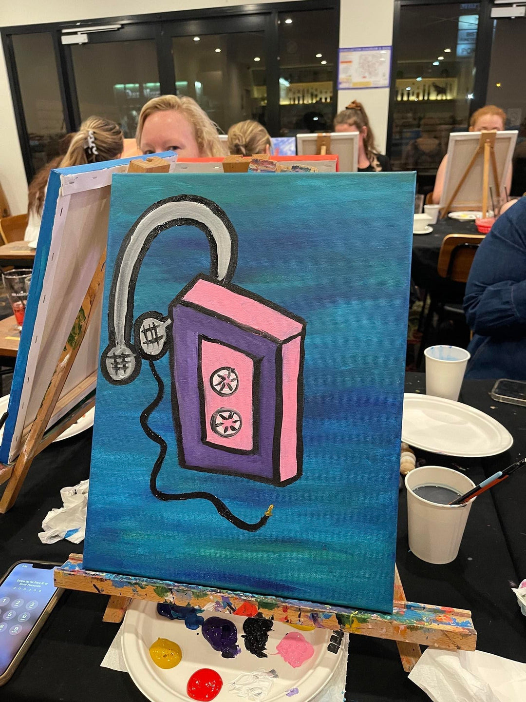 Paint Juicy guests at the Bundaberg 90s and 00s paint and sip night