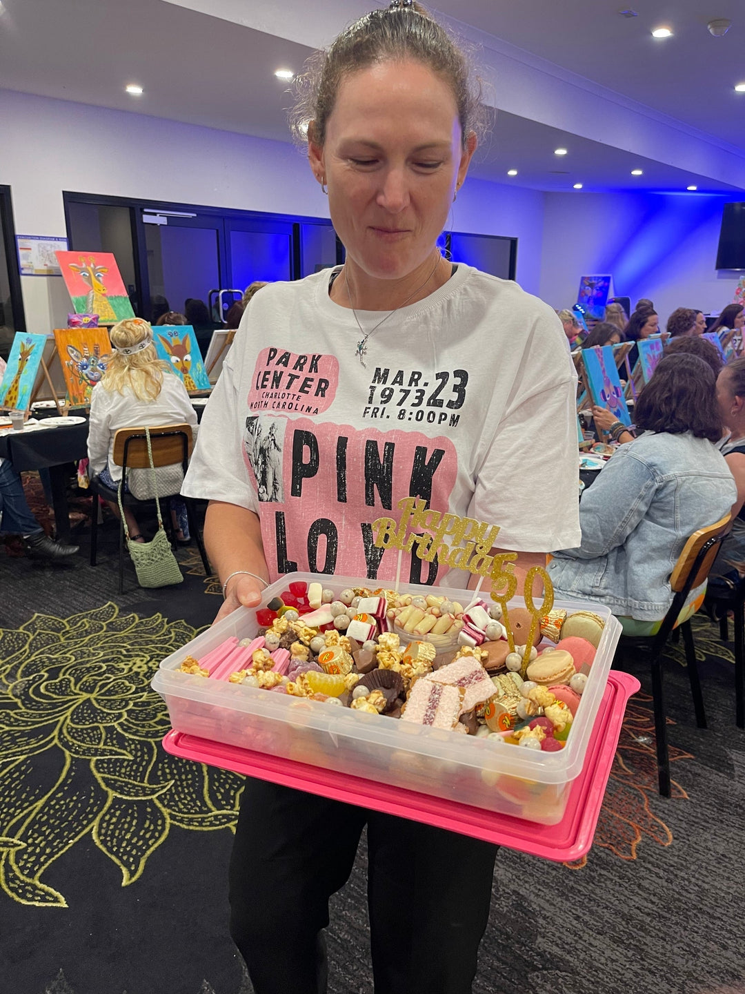 Customer holding a massive lolly pack in Bundaberg