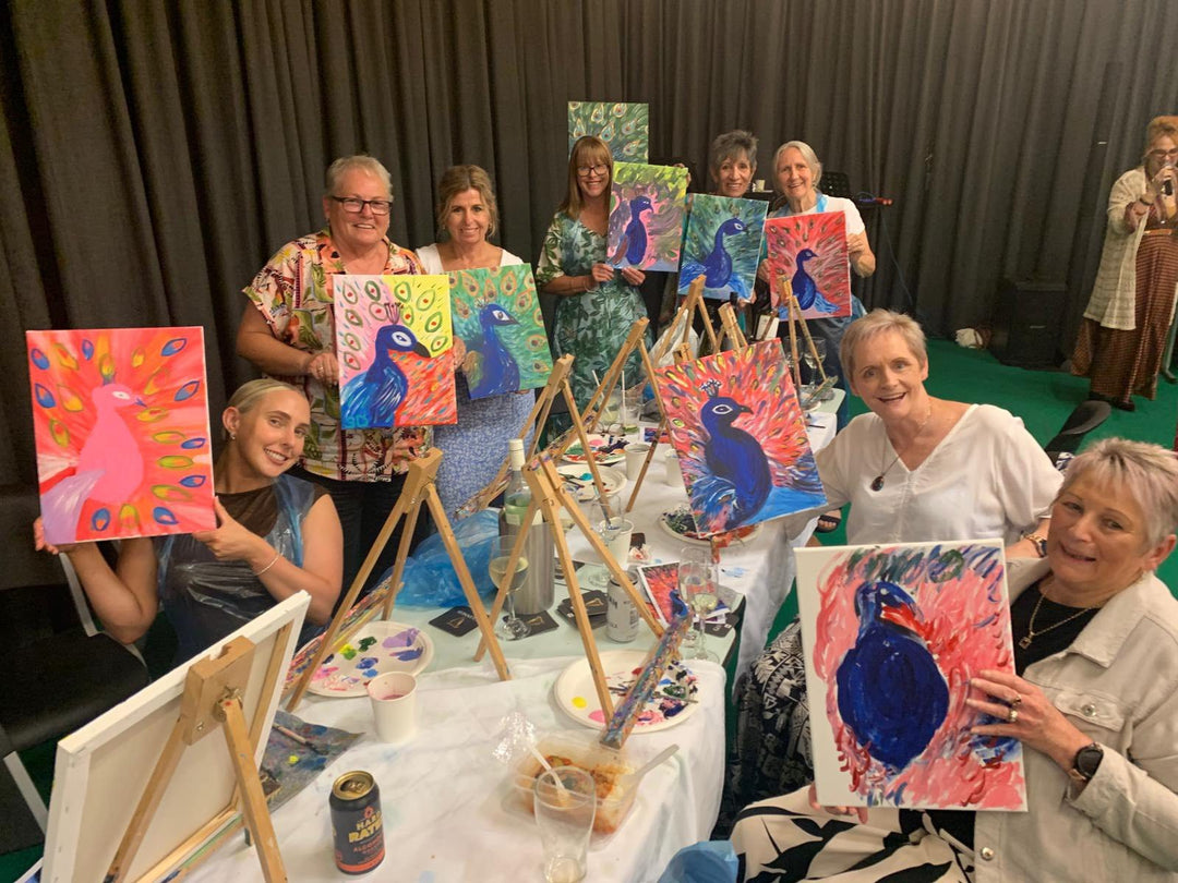 Cessnock Paint and Sip customers smiling with their artworks
