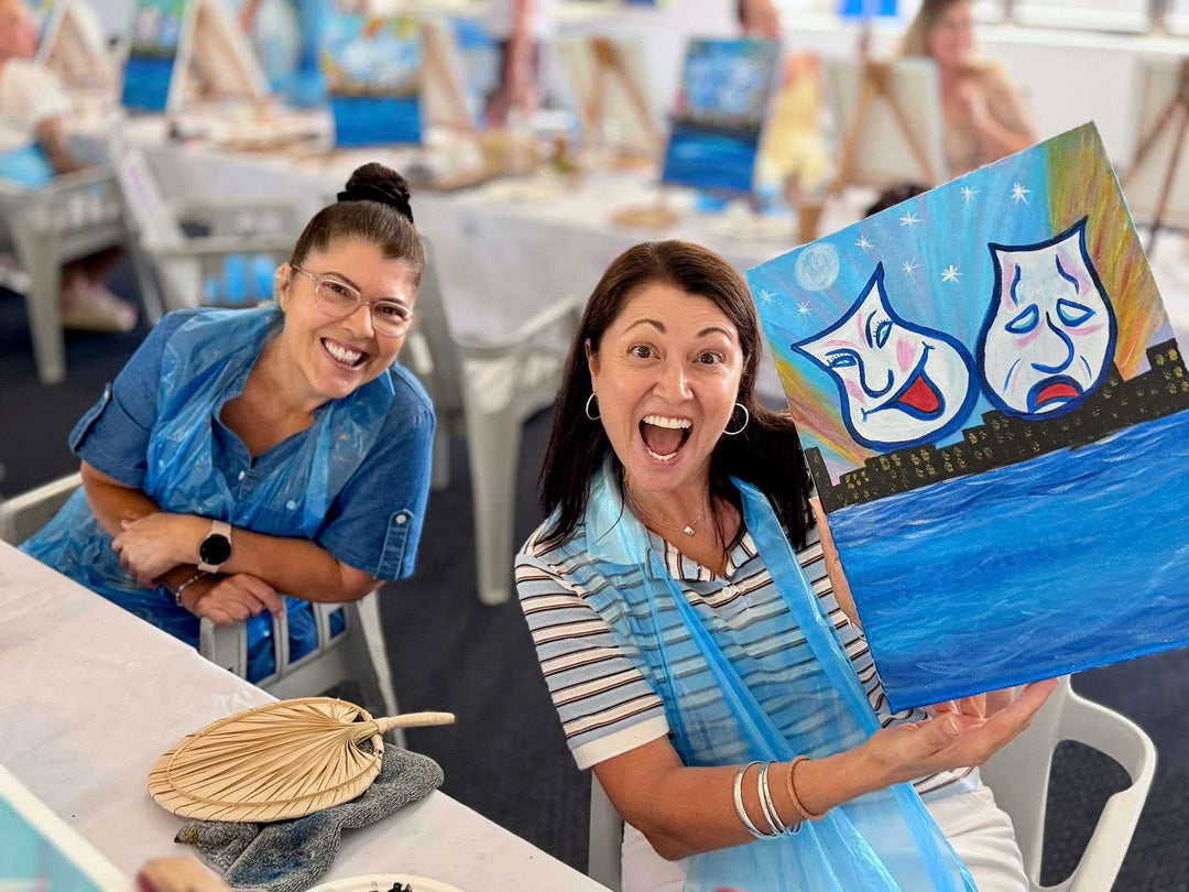 Hervey Bay Paint and Sip customers smiling with artworks