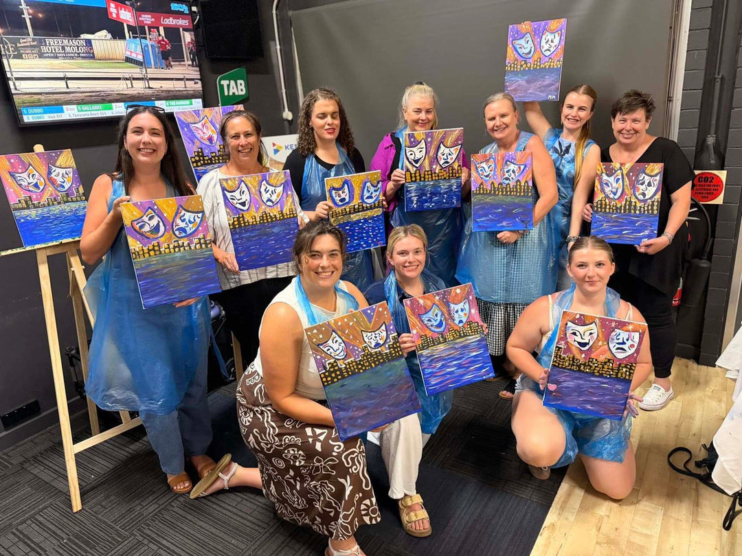 Newcastle Paint and Sip customers smiling with their artworks