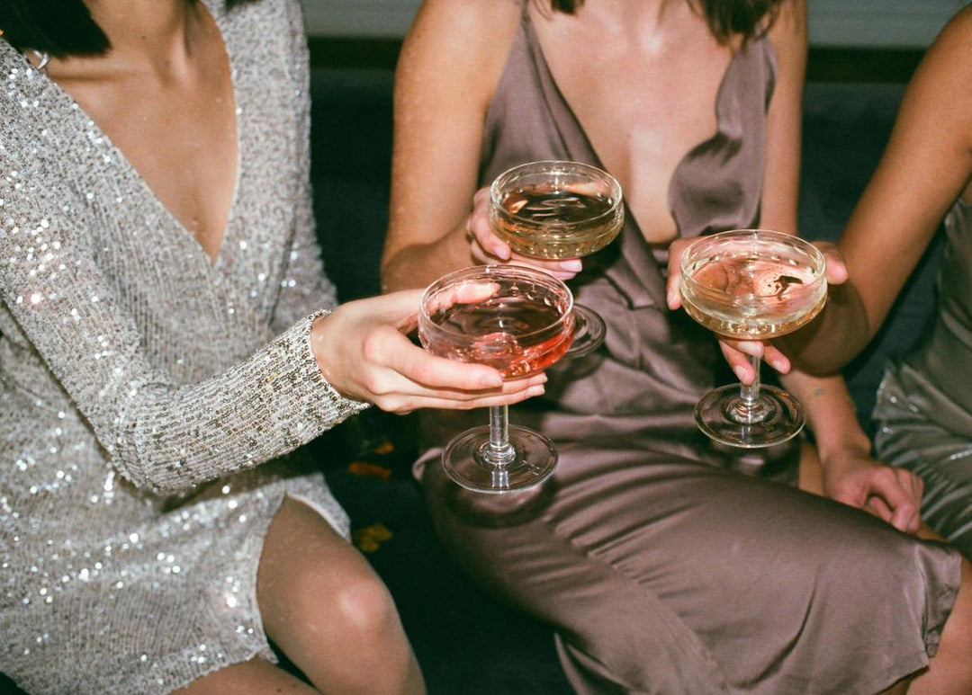 People having champagne at a paint and sip