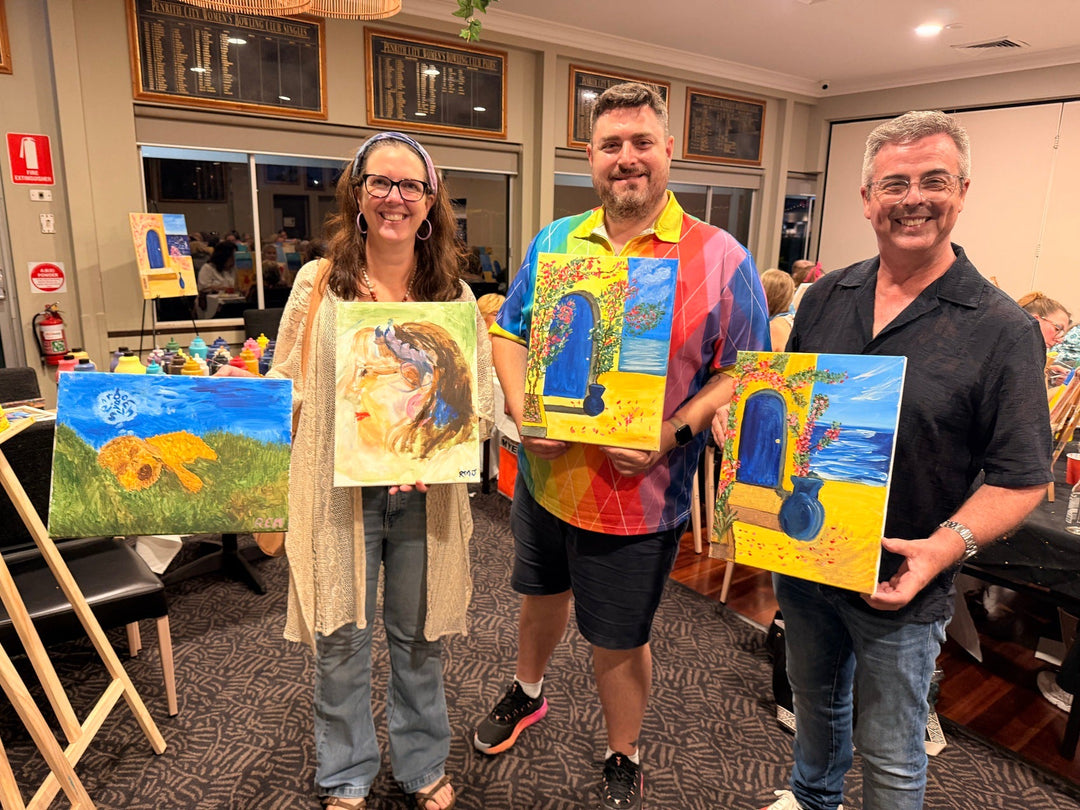 Customers smiling with their artworks at Penrith Paint and Sip