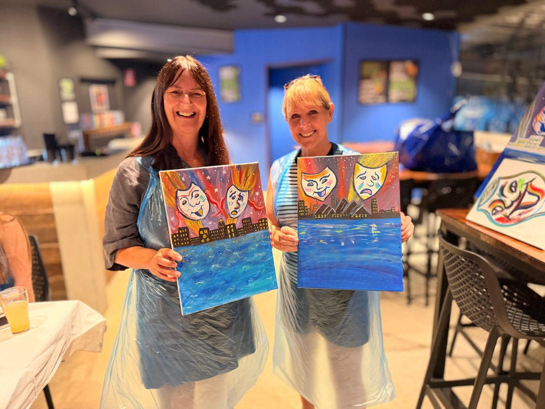 Sunshine Coast Paint ans Sip customers smiling while showing their vibrant artworks at Paint Juicy