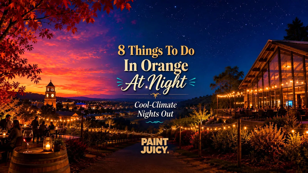Paint Juicy things to do in Orange at night, a cool-climate vineyard cellar door lit up with the town clock tower beyond