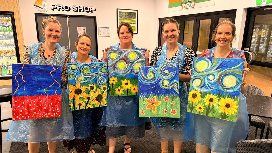 Five Palmerston Golf Club Paint and Sip guests holding their finished Van Gogh sunflower paintings by the Pro Shop