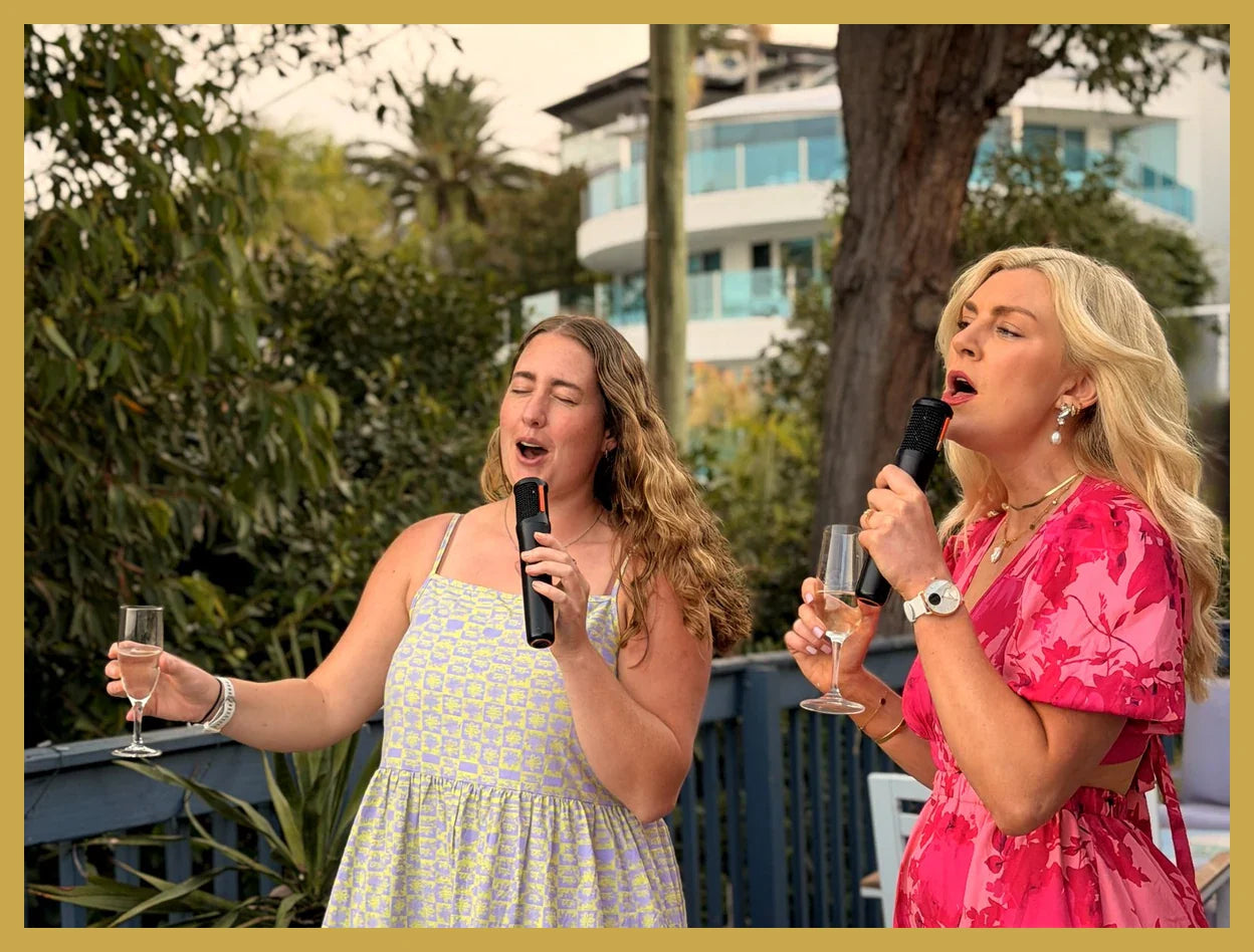 Karaoke moment at a Paint Juicy private session, one of the entertainment add-ons