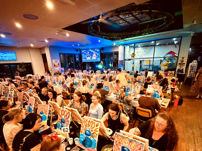 large group of people at paint and sip Paint Juicy